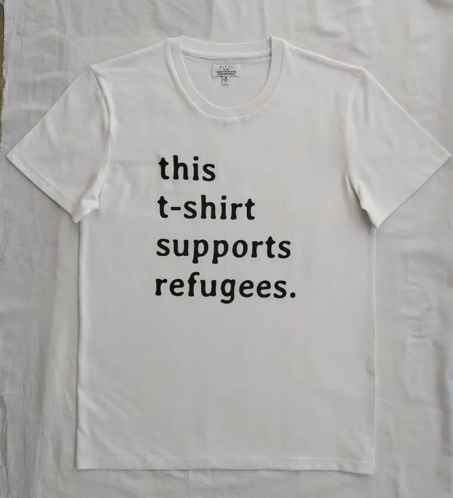 Sitti x UNHCR: "this t-shirt supports refugees." Unisex T-Shirt.