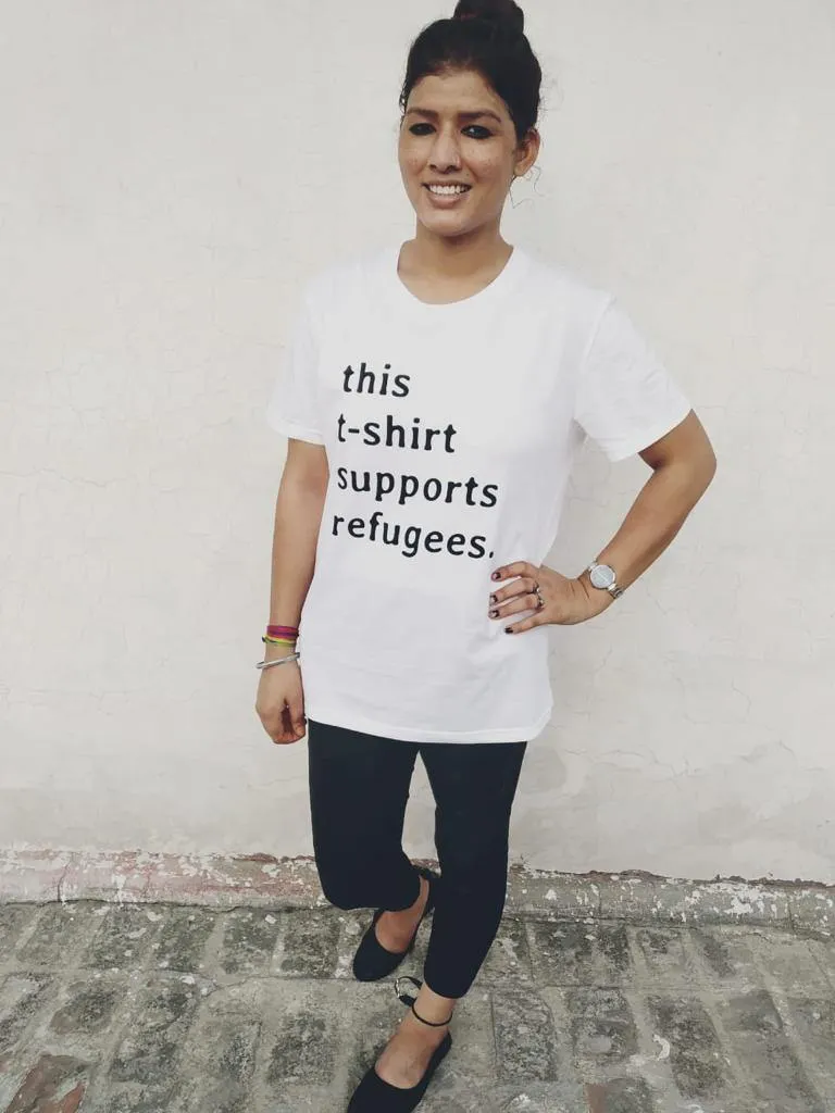 Sitti x UNHCR: "this t-shirt supports refugees." Unisex T-Shirt.