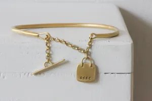 Solid Gold Open cuff bracelet with chain closure